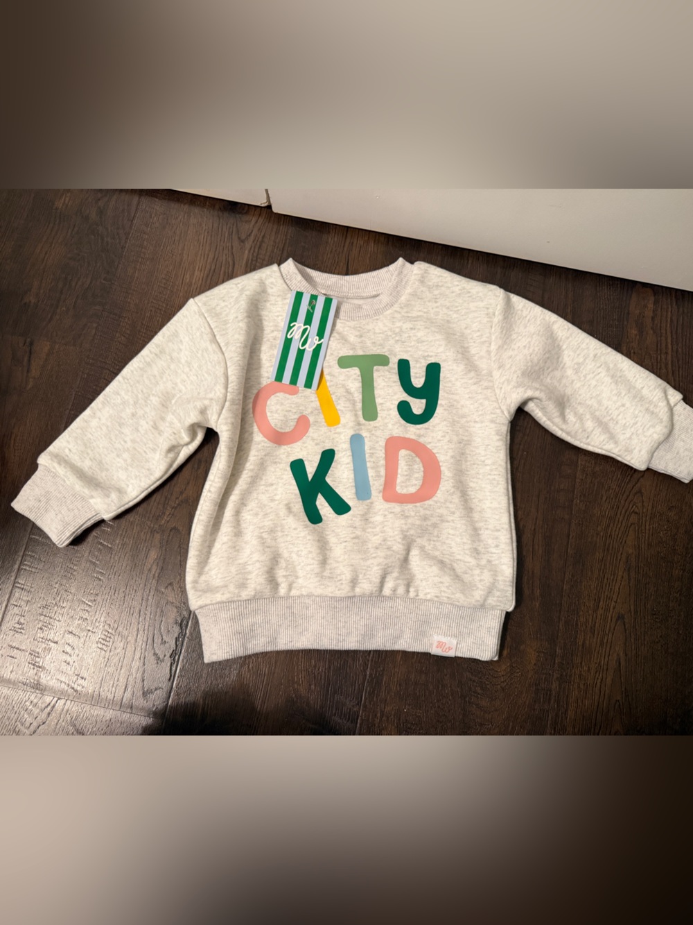 Cream Sweatshirt with Colorful 'CITY KID' Graphic